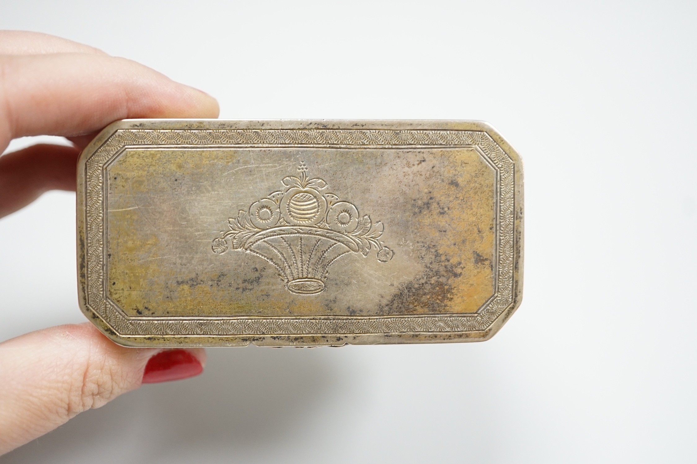 A 19th century German? engraved gilt white metal double hinged octagonal snuff box, 86mm.